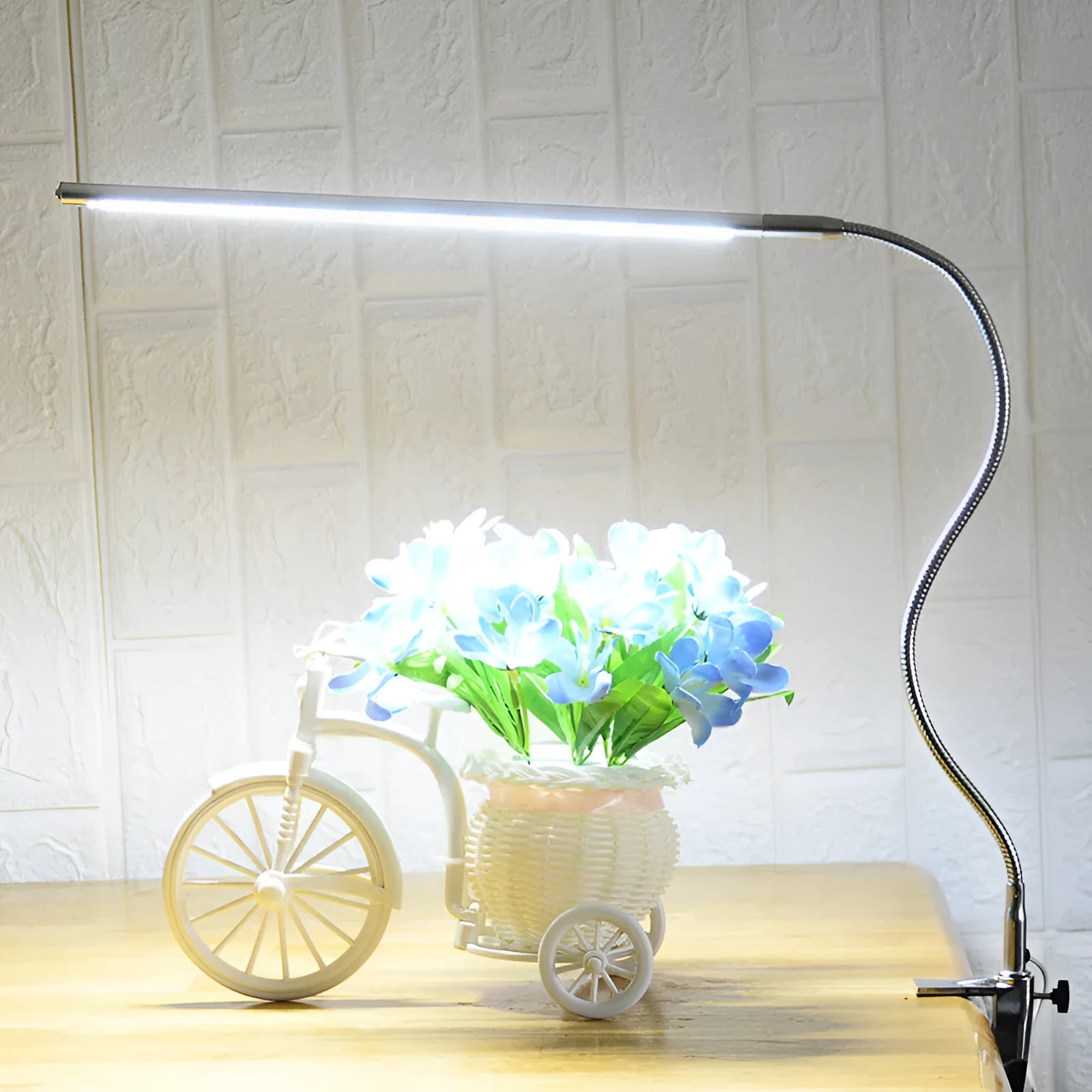 Silver aluminium alloy LED clip table lamp with long arm for nail art and crafting, showing clip attachment and USB cable