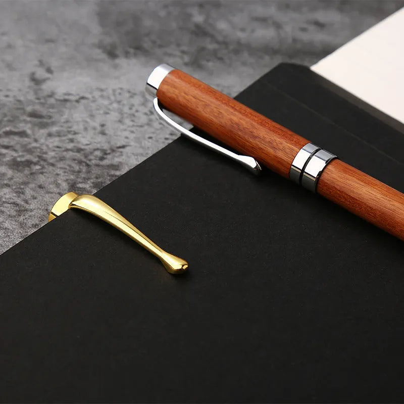 Wooden metal ballpoint pen with rosewood barrel on desk surface, 14cm length, gold colour option