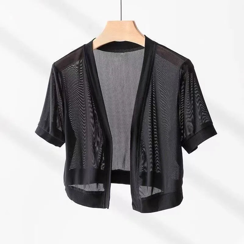 Women's French-style irregular collar long sleeve shirt with bell sleeves and tied front in black colour