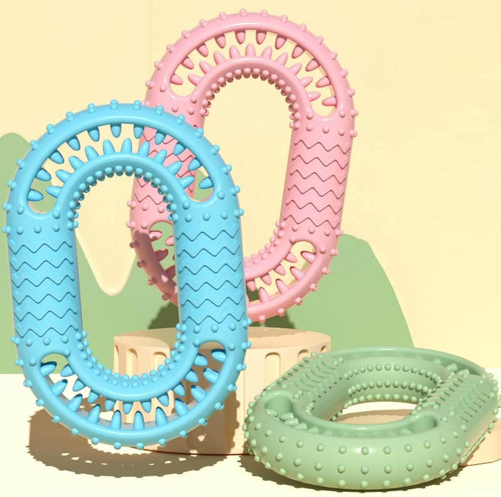 Blue o-ring shaped dog chewing toy for aggressive chewers and dental plaque reduction