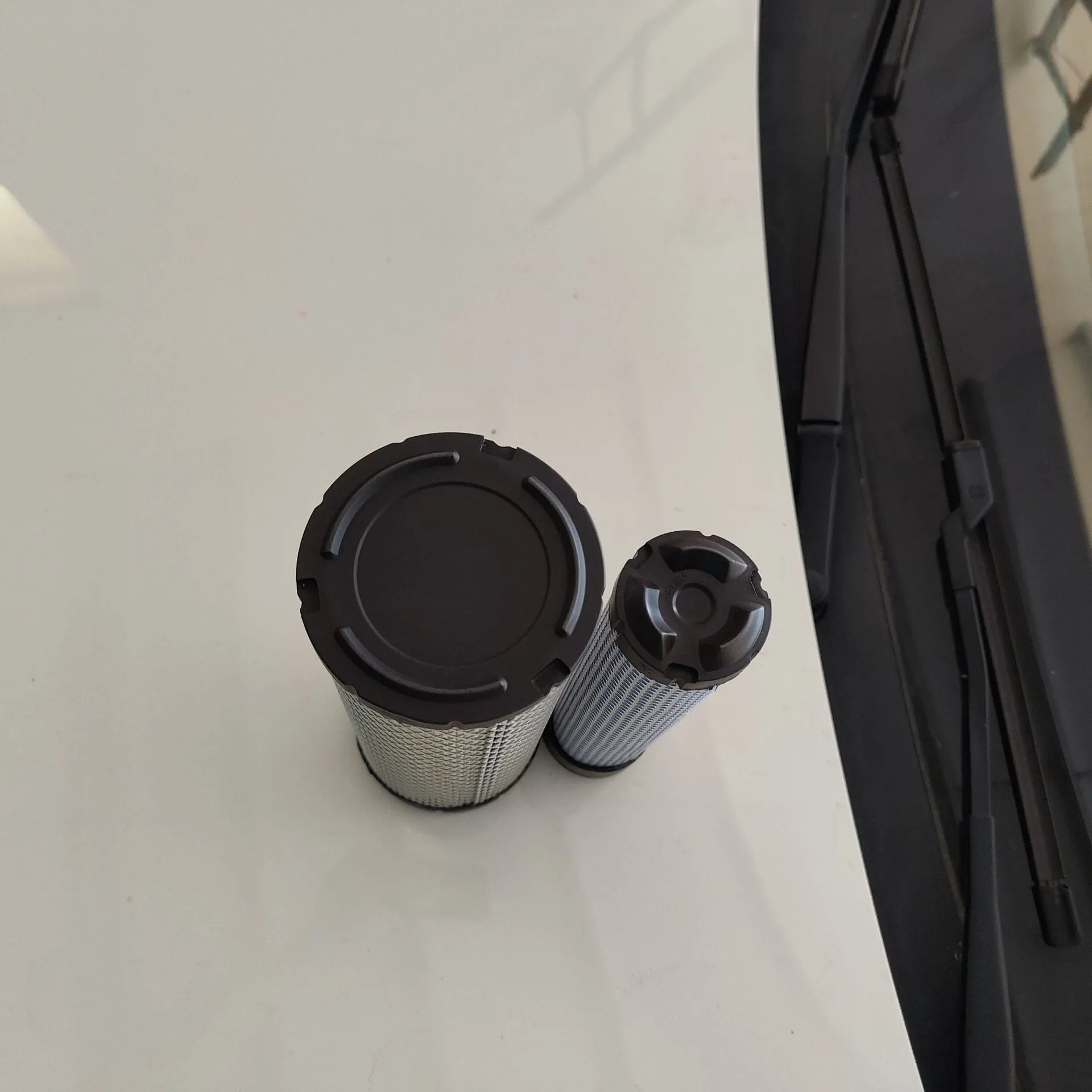 Donaldson 1027 straight head air filter with G057513 elbow, showing large circular filter element.
