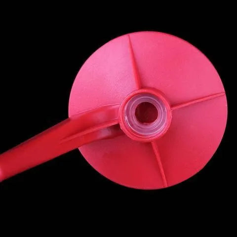 Red Magic Tap soda bottle dispenser with push button, 15cm tall