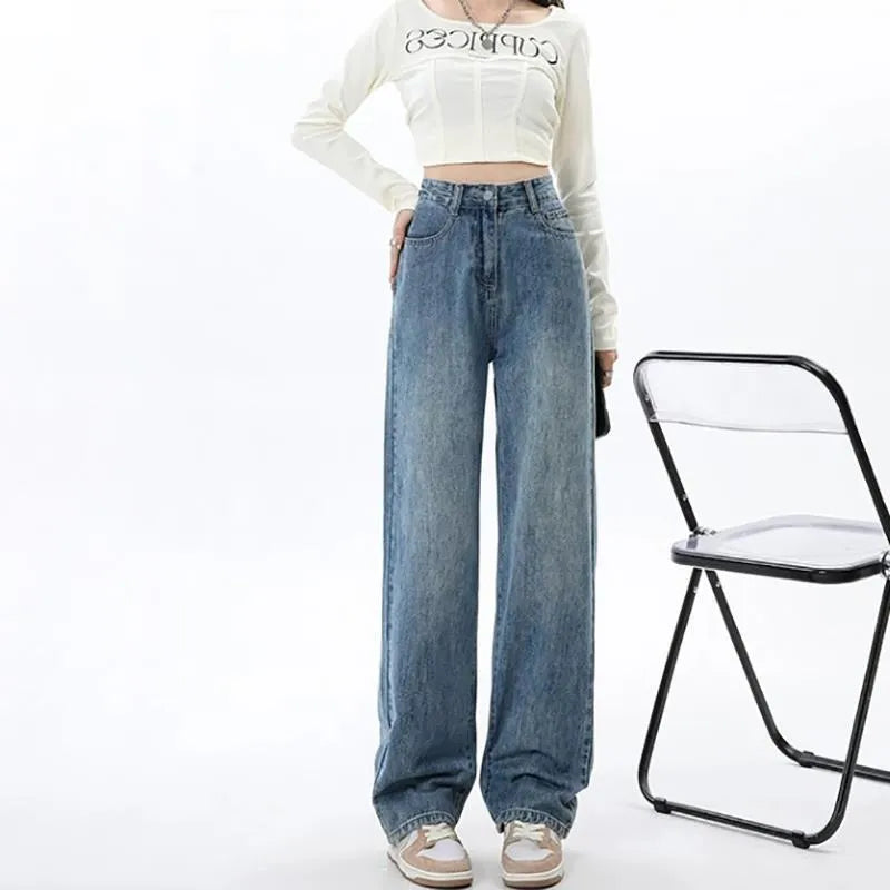 Women's retro blue high-waist wide-leg jeans with straight cut on a model