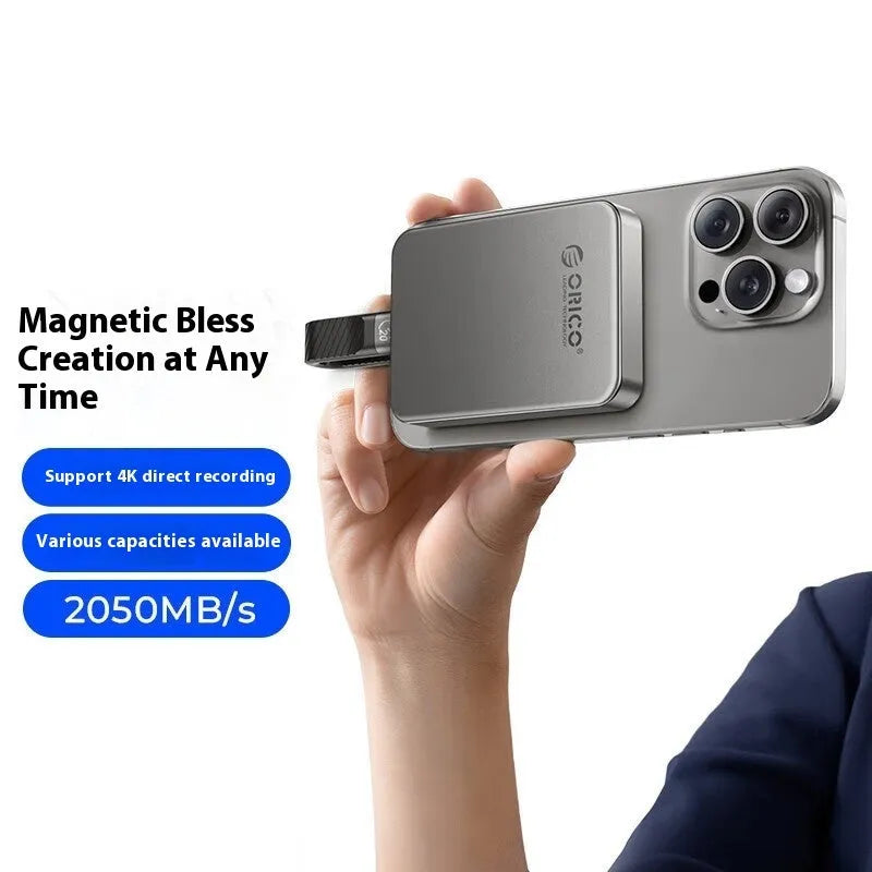 Grey magnetic mobile SSD measuring 80x60mm with ultra-thin 11.2mm profile and included C to C cable