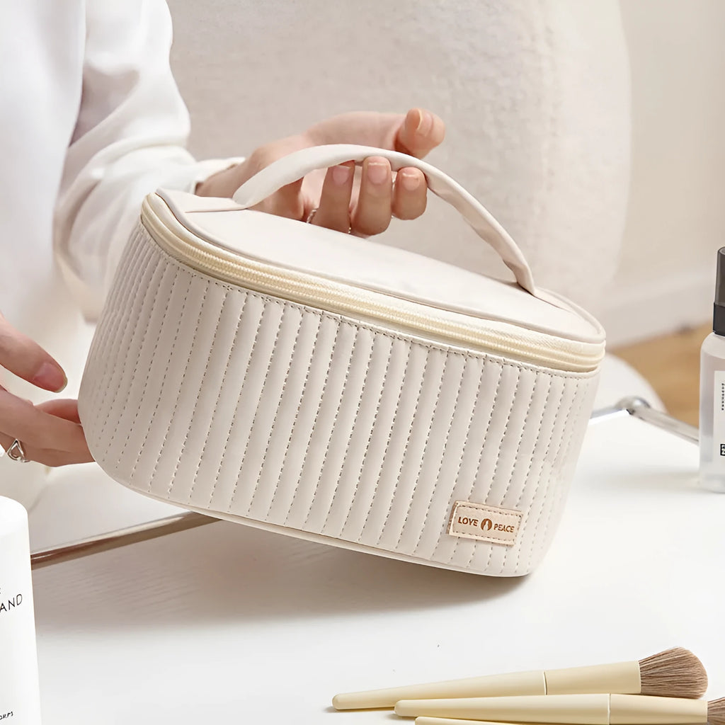 Open-top PU leather makeup bag shown in a pastel colour from the range of six options.