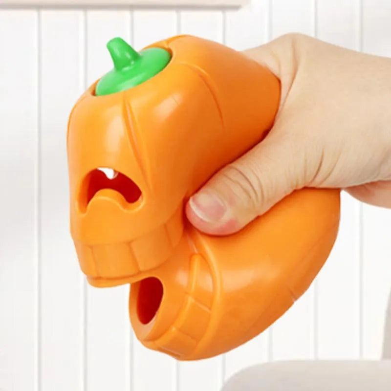 Yellow pumpkin-shaped TPR dog chew toy for aggressive chewers, 8.6x11.5cm