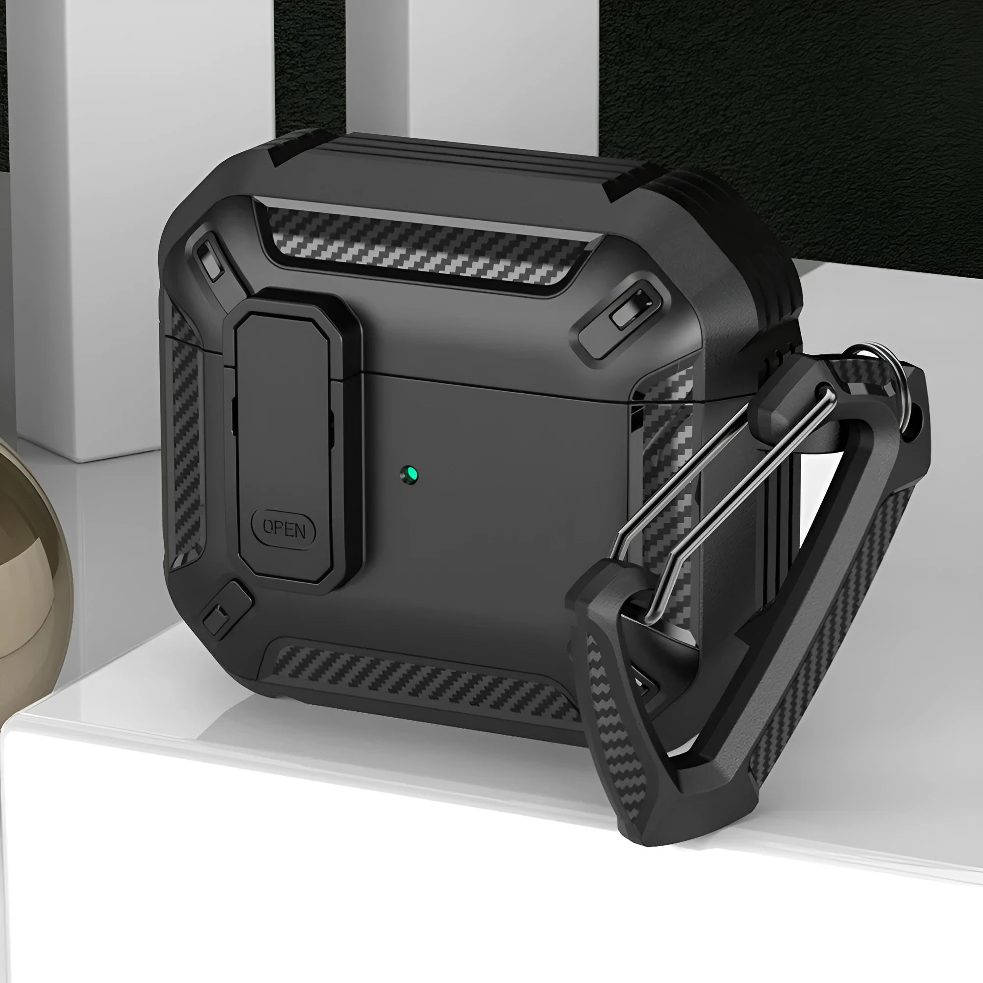 Two-tone plastic clamshell protective case for Apple AirPods with a metal carrying hook attached.