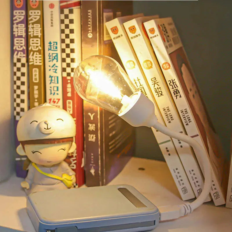 Foldable USB rechargeable night light with glowing tungsten filament S14 bulb