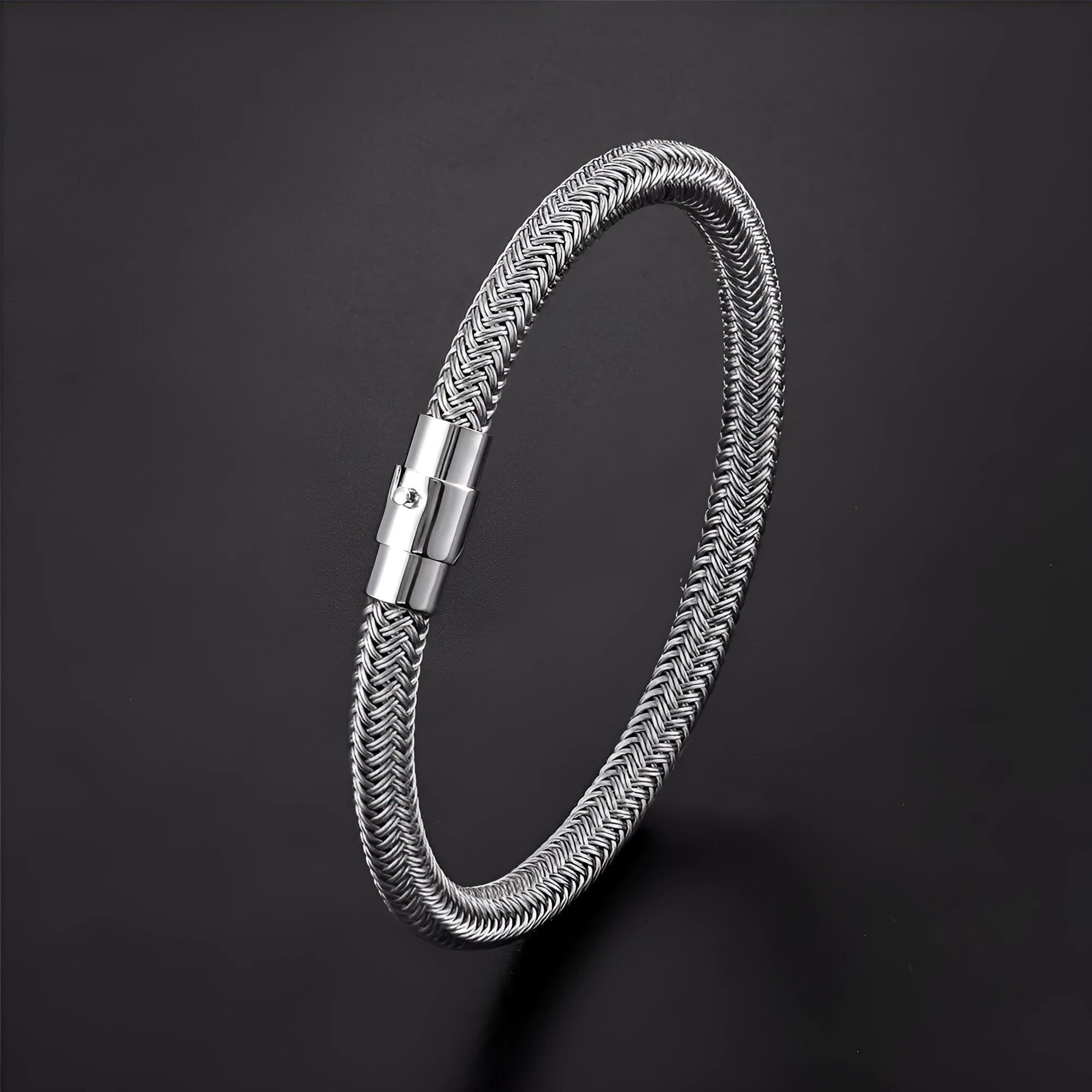 Titanium steel geometric wire bracelet with magnet socket closure showing linear design elements