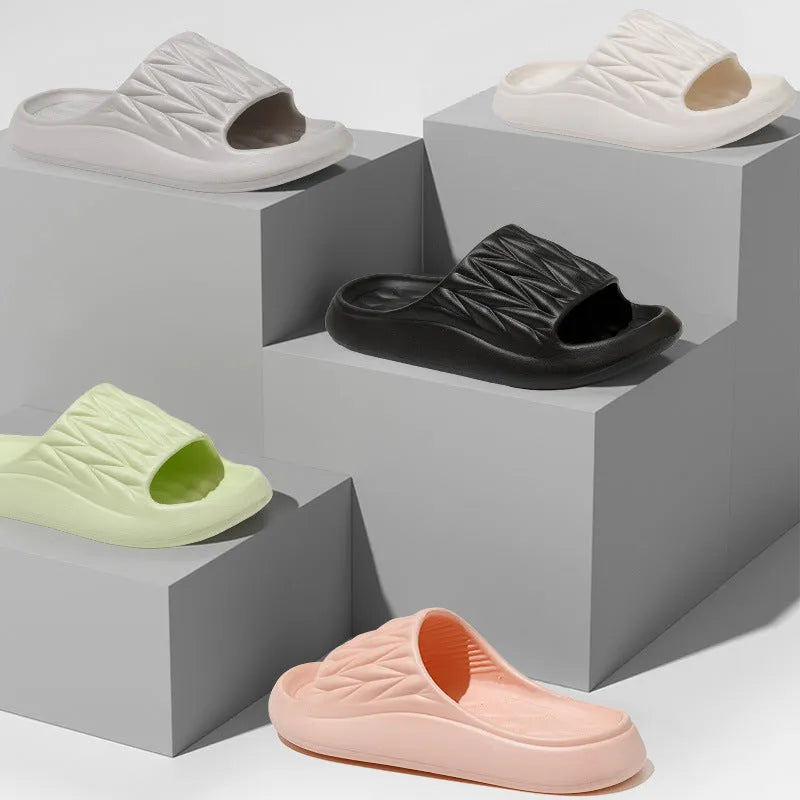 Leaf texture design EVA slippers for men and women in various colours on a white background.
