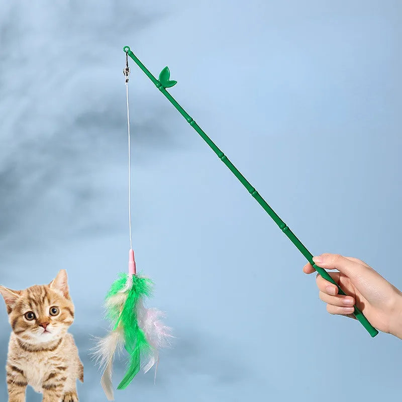 Green interactive cat feather wand toy with bells and durable construction for playful stimulation