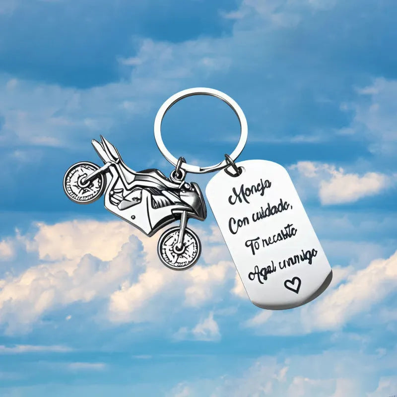 Stainless steel motorcycle keychain with inspirational design and a flannel bag