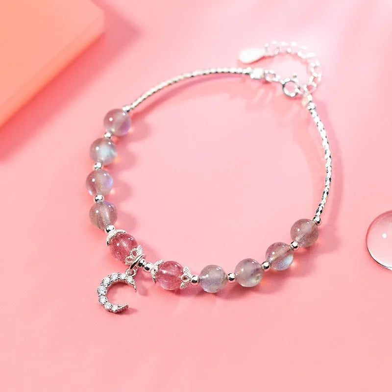 Moonstone bracelet with crescent moon charm on adjustable extension chain