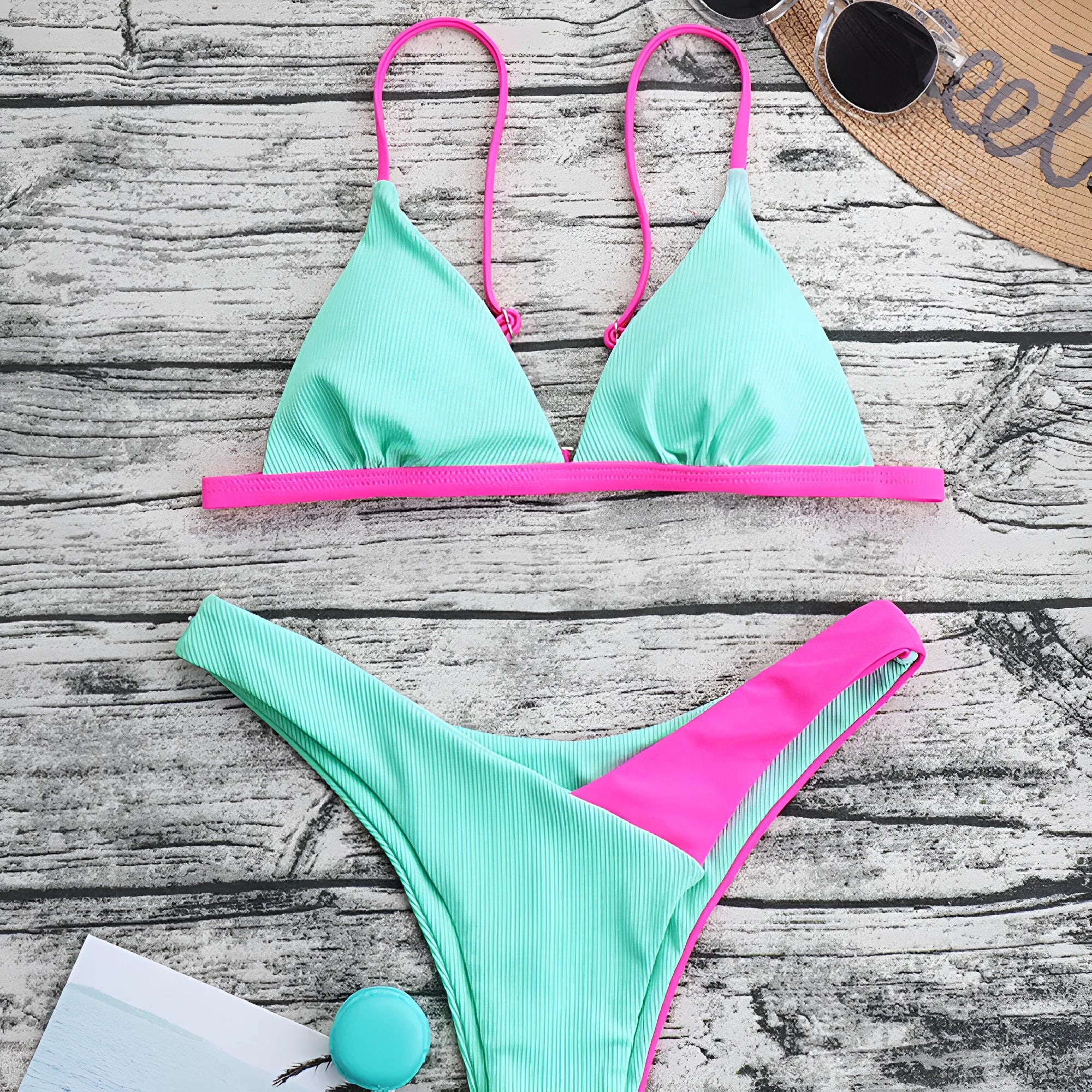 Women's patterned nylon bikini set with brief style bottoms on a white background.