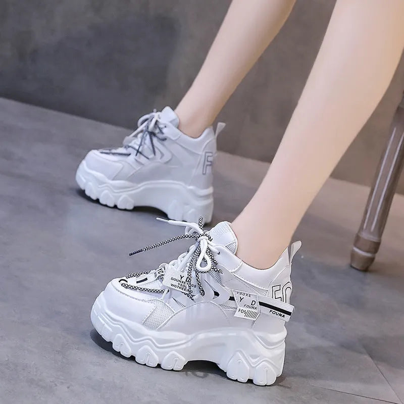 Women's white mesh platform sports shoes with cross-strap design and rubber sole