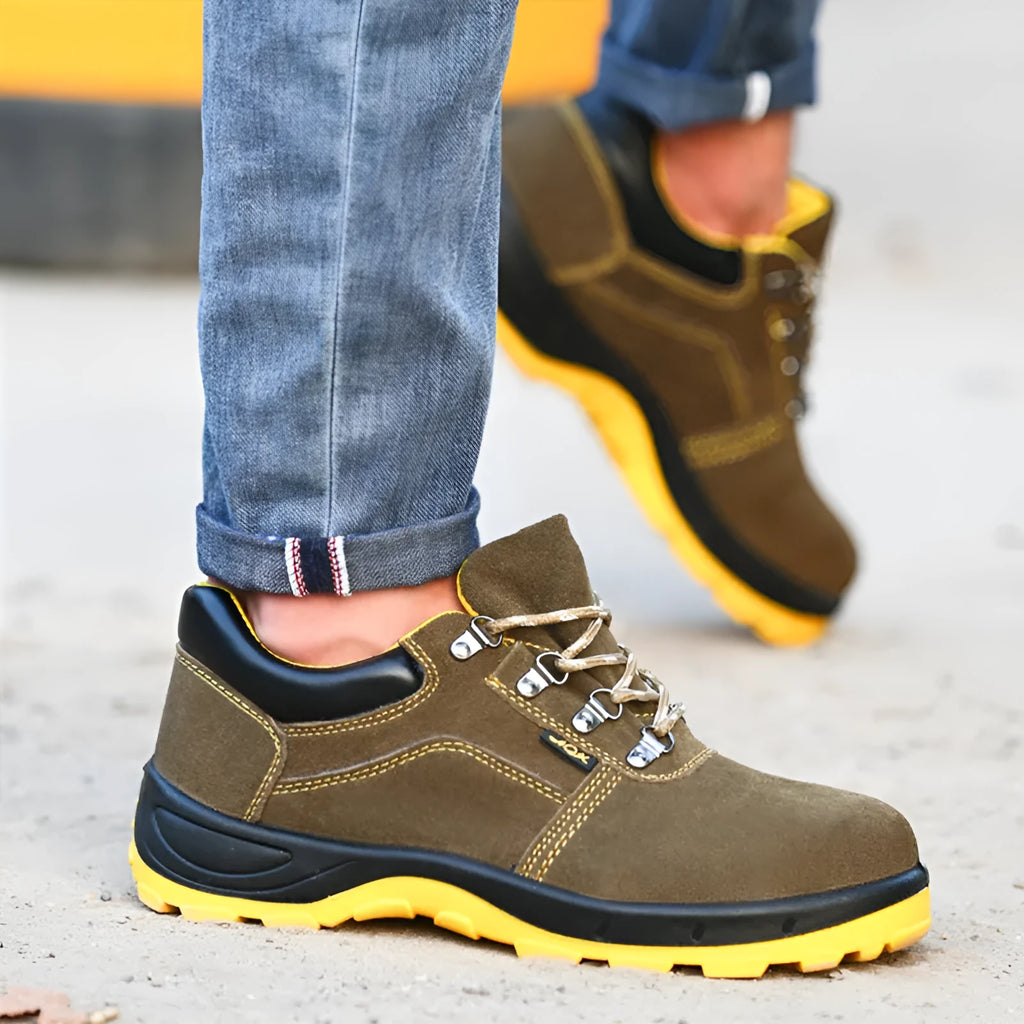 Bronze coloured cow suede leather safety boots with a steel toe cap on a non-slip sole.