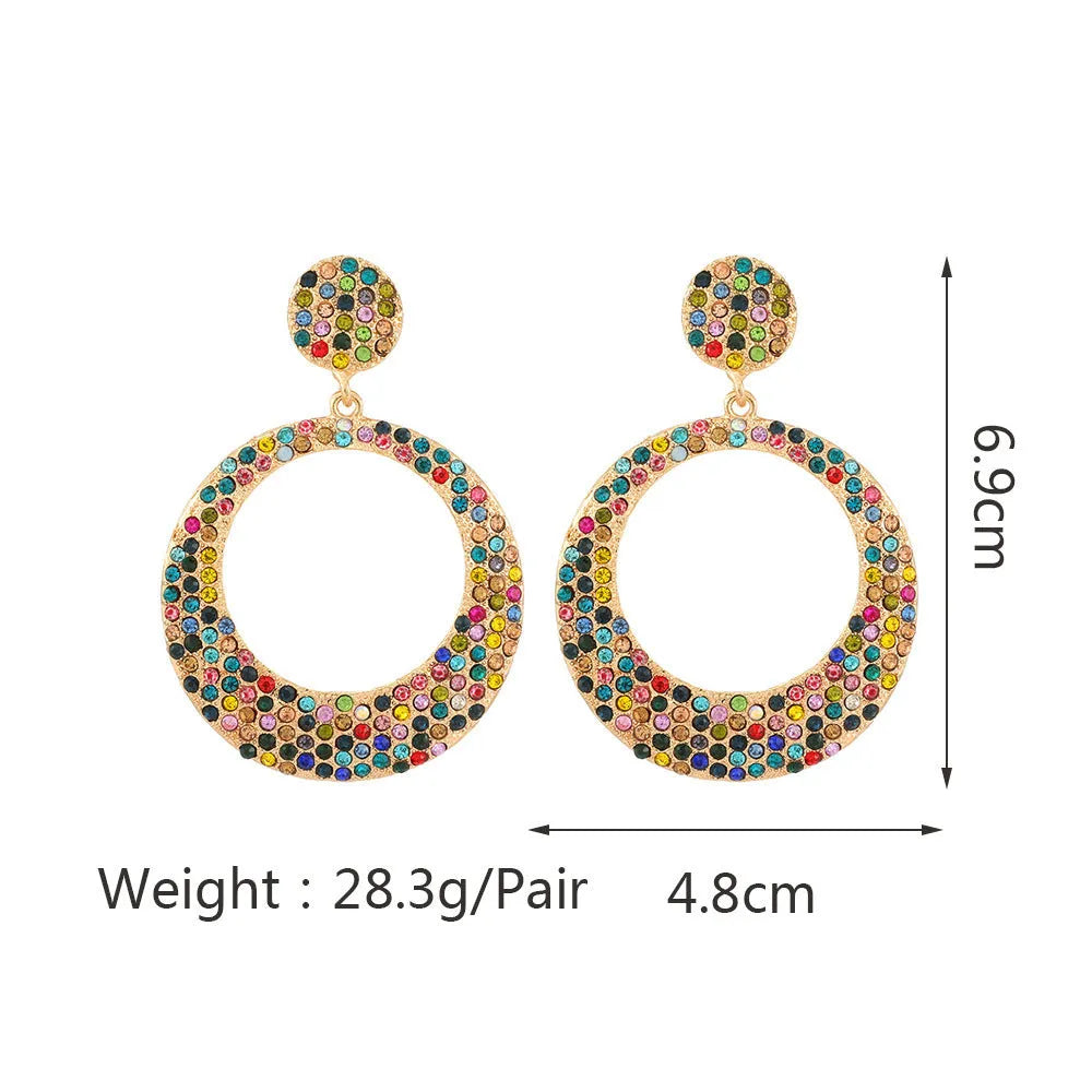 Colourful alloy drop earrings with large round pendants featuring diamond-effect detailing and cartoon-inspired styling