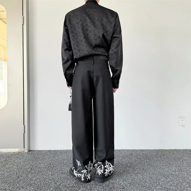 Pleated wide leg straight pants black cotton blend with elastic waist on mannequin