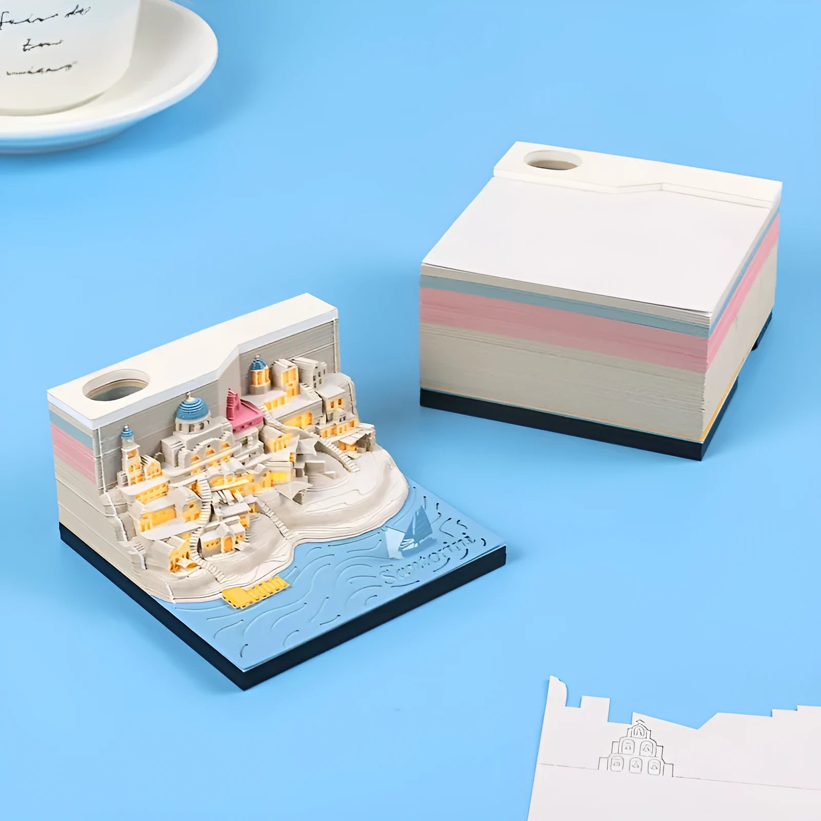 Santorini 3D notepad paper carving building model with 166 pages on desk