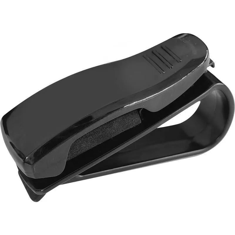 Black plastic car sunshade clip holder for glasses and tickets on a car visor