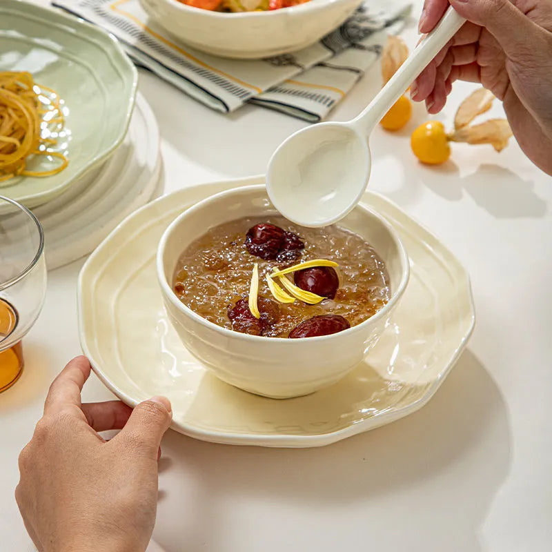 Solid colour ceramic tableware set of seven pieces in a gift box, showing modern simple design.