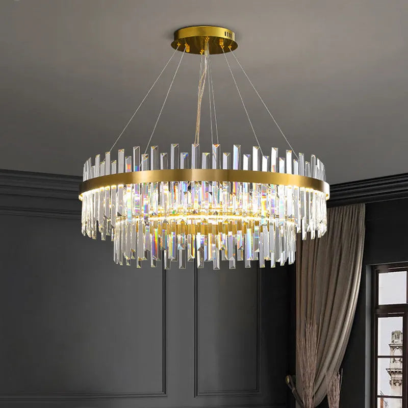 Stainless steel and crystal multi-head chandelier light with adjustable height for ceiling.