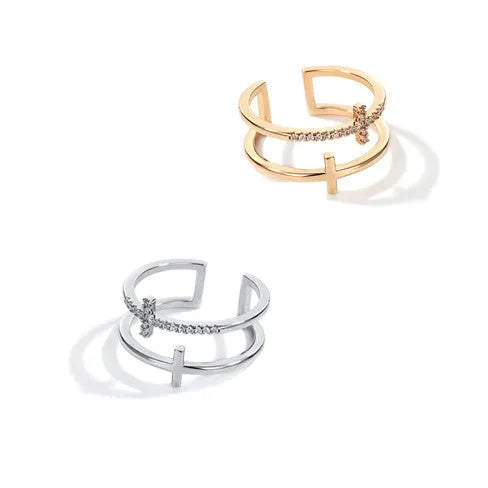 Adjustable double cross geometric ring in white gold colour with sterling silver and zircon gem inlay.
