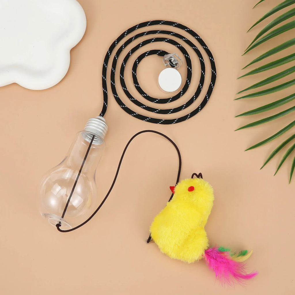 Grey and yellow hanging interactive cat toy mounted on door frame with elastic rope and treat bulb