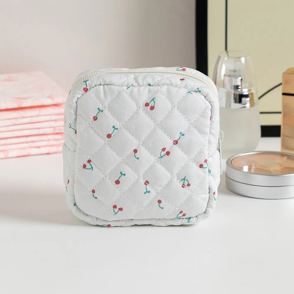 Polyester key storage bag with floral pattern and sewing thread decorative details