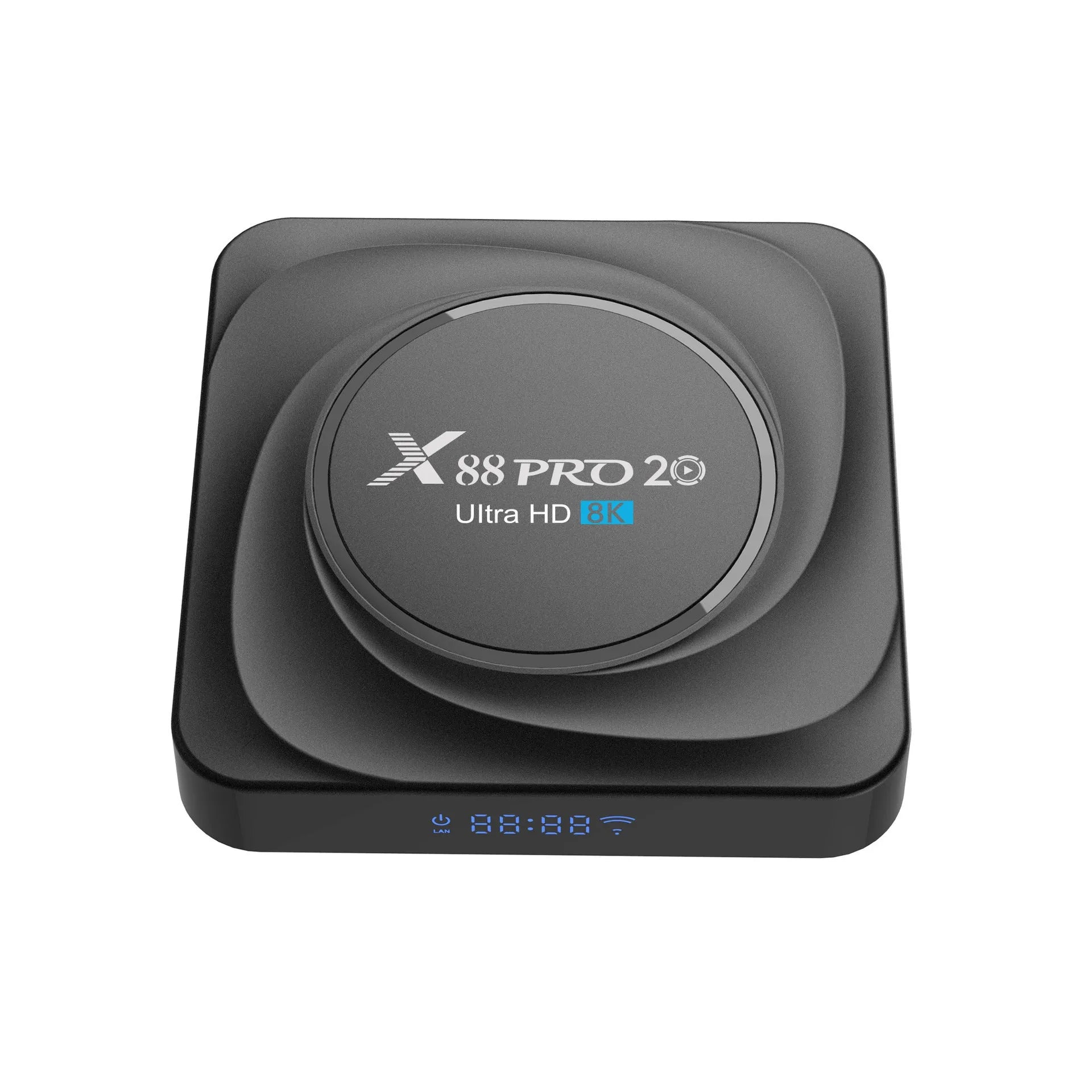 Compact black Android 11 TV box with remote control and HDMI cable on a table
