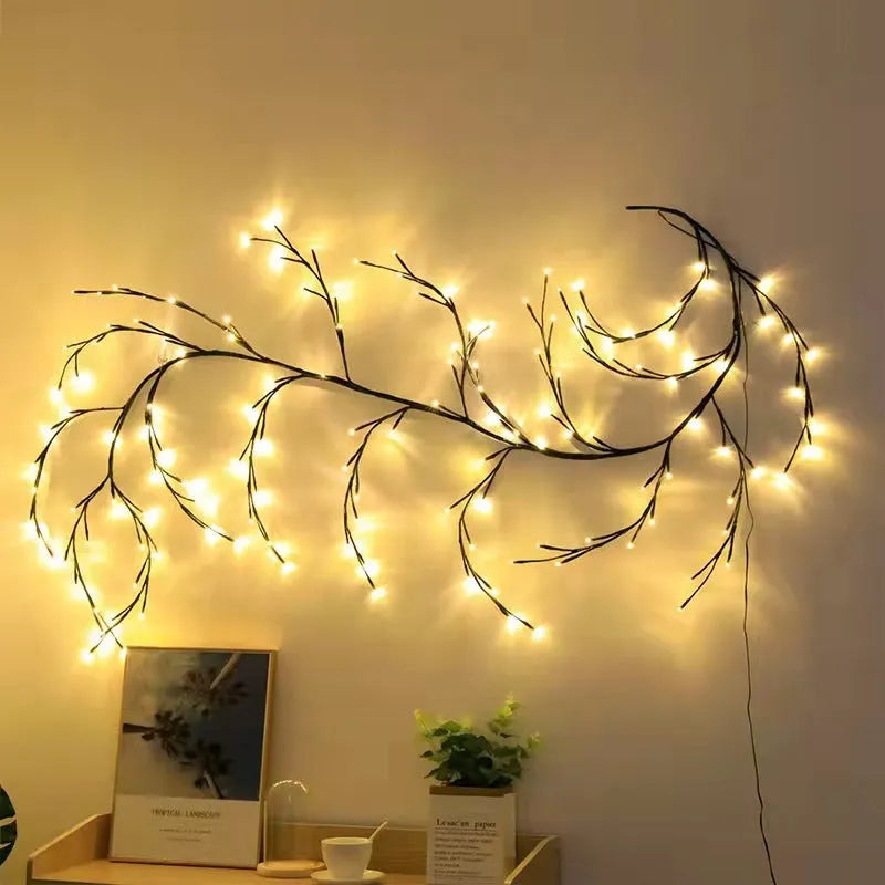Flexible DIY willow vine LED light garland with warm white lights bent into a decorative shape.