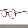 Women's ultra-light multi-focus presbyopic glasses in black and blue focus frame colour on a table.