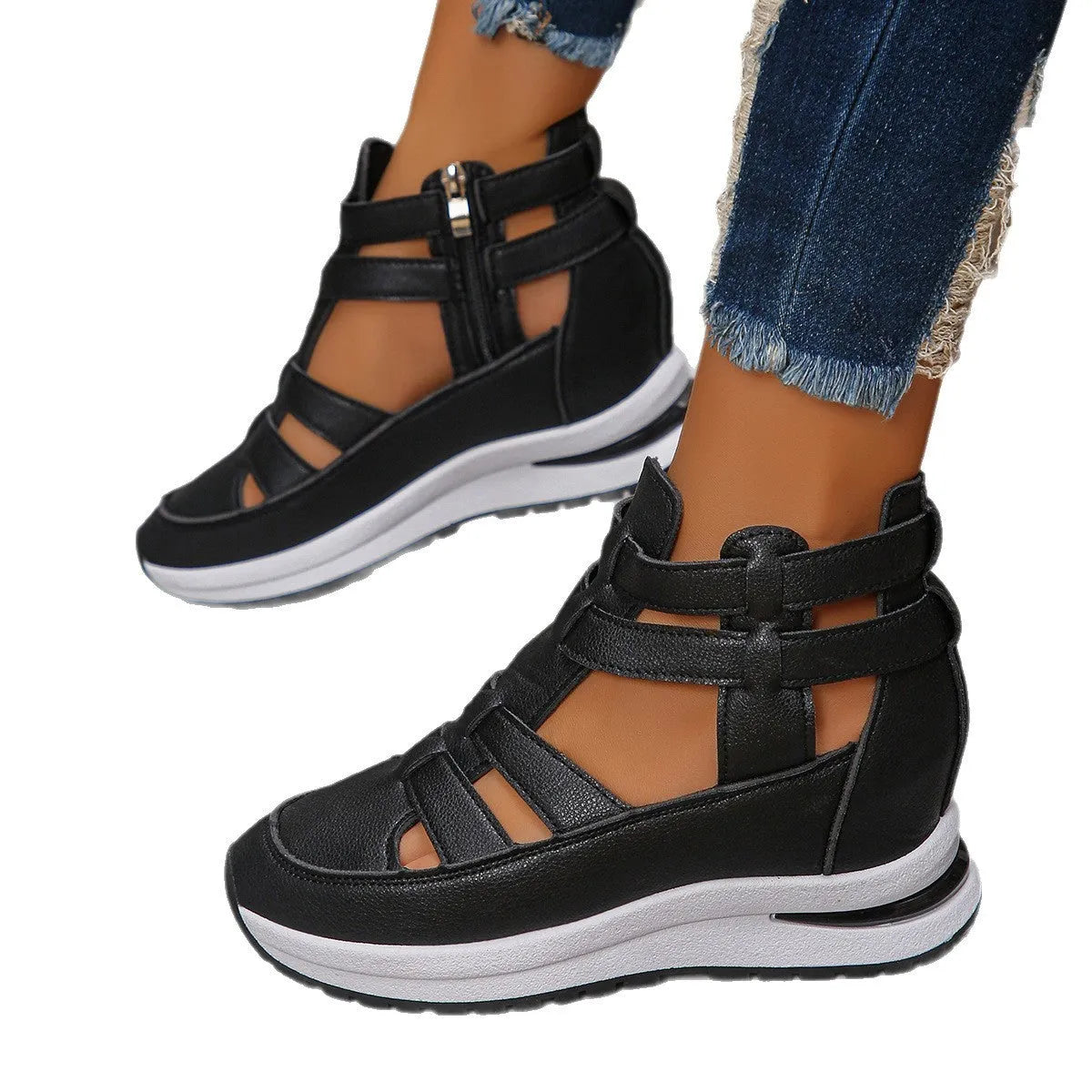 Women's black platform sandals with hollow-out design and Velcro strap.
