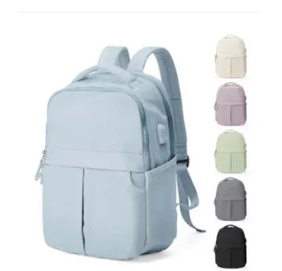 Unisex nylon travel computer backpack in black with multiple pockets and soft carry handle 43x30x13cm
