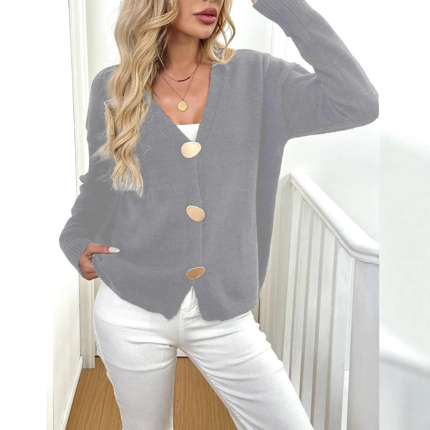 Women's deer plush sweater coat with princess sleeves in black colour showing irregular cut design