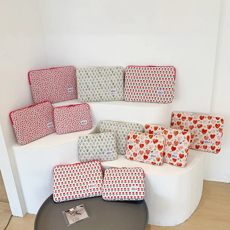 Women's floral print laptop bag in cloth material with anti-shock padding