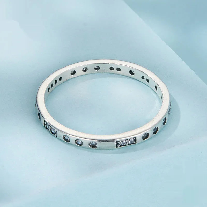 Silver Moss Password I Love You ring with oxidised black finish showing simple bracelet design