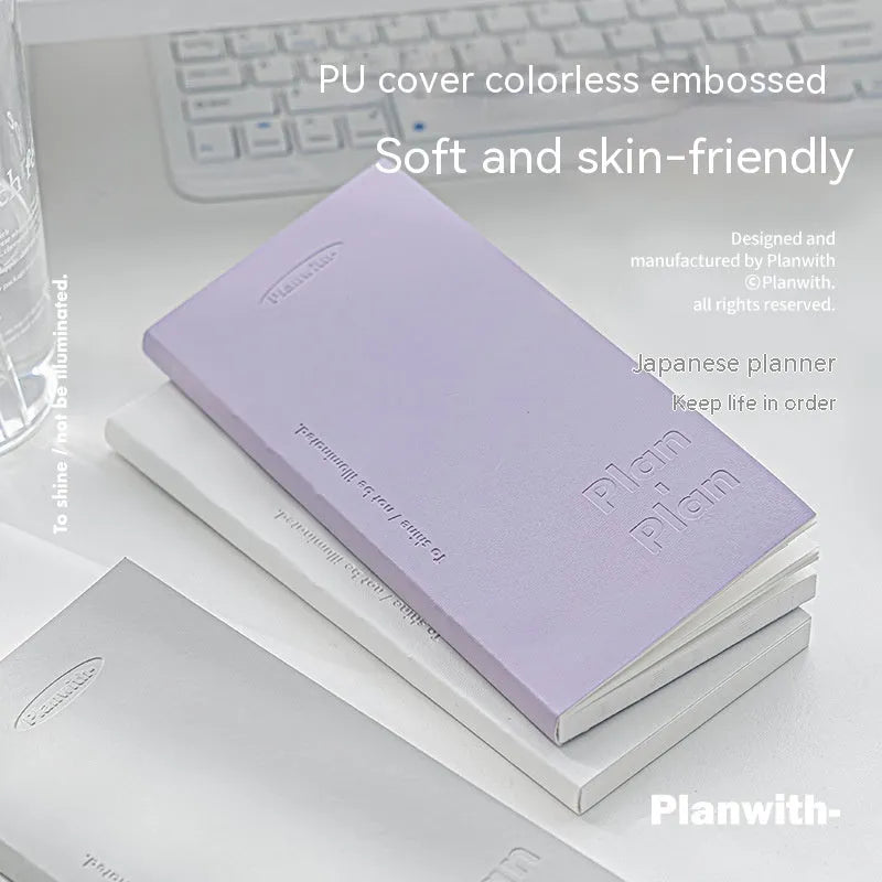 Embossed meter book open to show white pages, with blue cover option displayed.