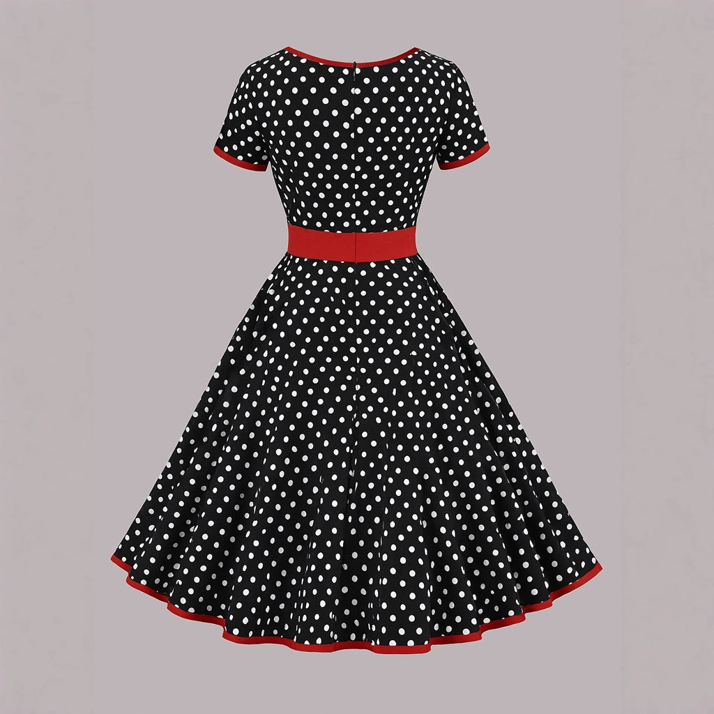 Square collar polka dot dress with pleated skirt and zip front closure in multicolour pattern