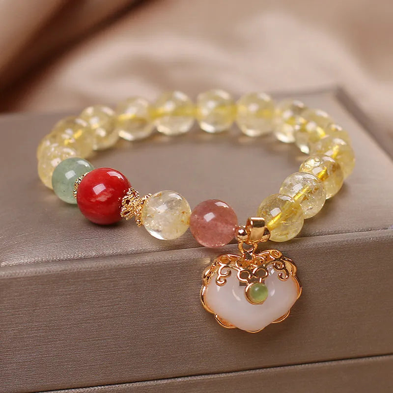 Women's bracelet with a natural yellow citrine jade ruyi pendant on an alloy chain