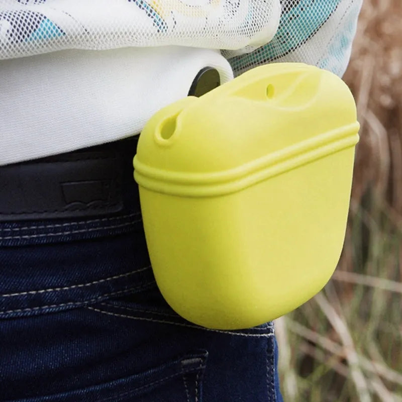 Silicone dog training treat waist bag with clip and magnetic closure in assorted colours.