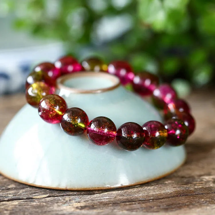 Women's watermelon crystal bracelet showing handmade construction with casual pastoral style