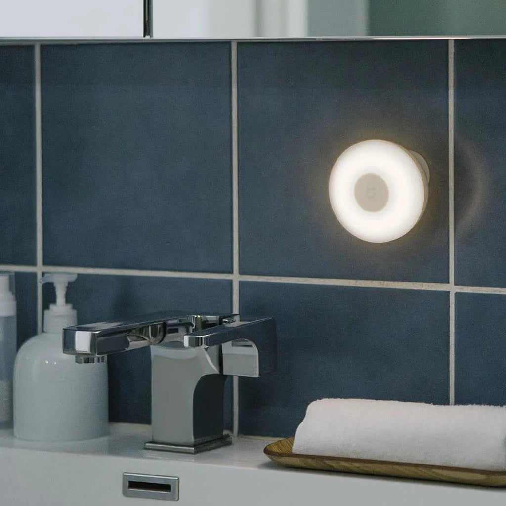 White modern bedside table lamp with Bluetooth and motion sensor features