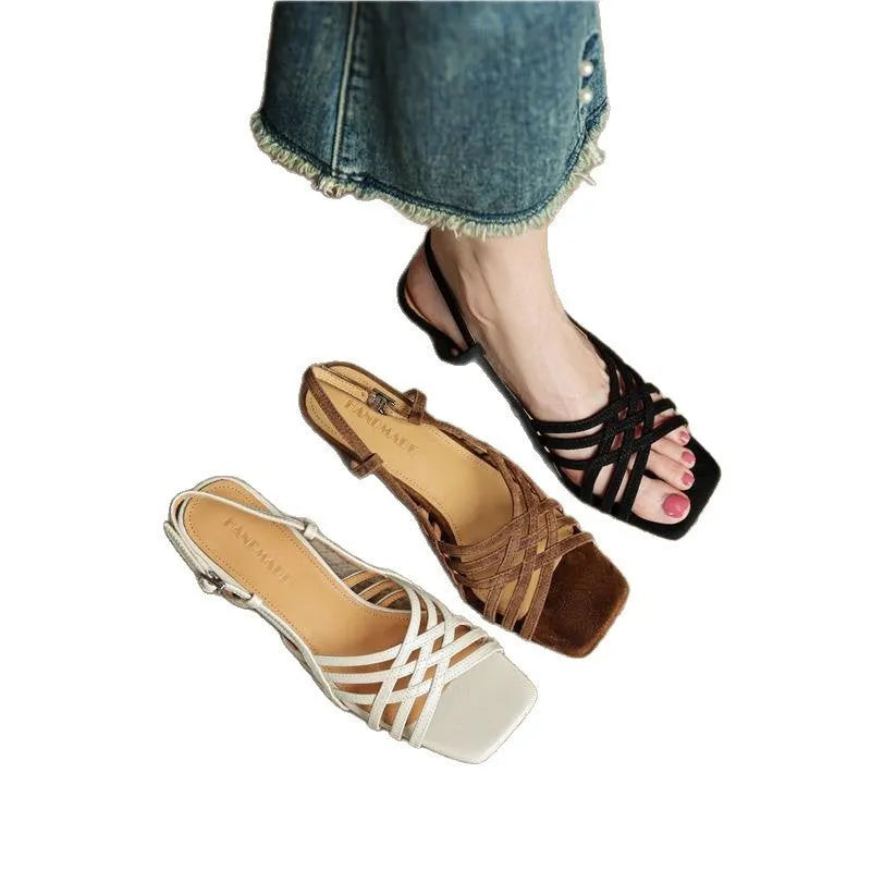 Retro women's high heel sandals with thin brown cross straps and an ankle buckle on a square toe.