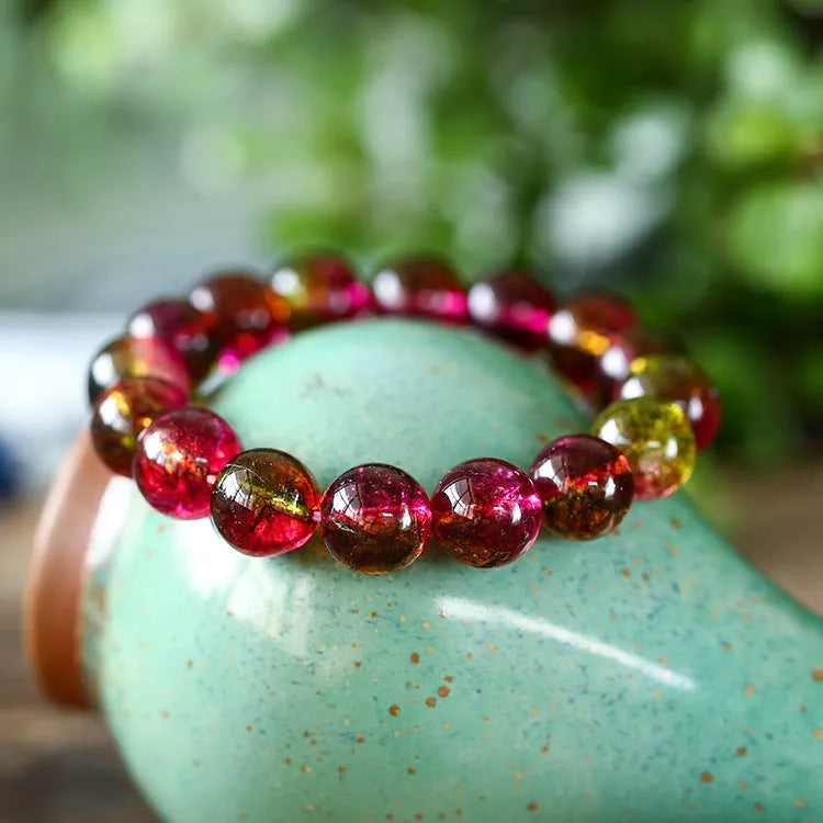 Women's watermelon crystal bracelet showing handmade construction with casual pastoral style