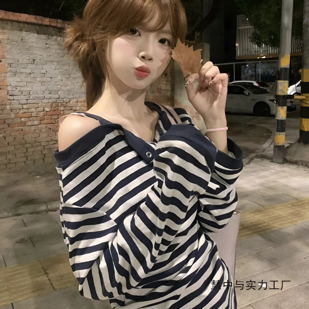 Dark blue Korean-style oversized women's long-sleeve t-shirt with stripe and embroidery detail.