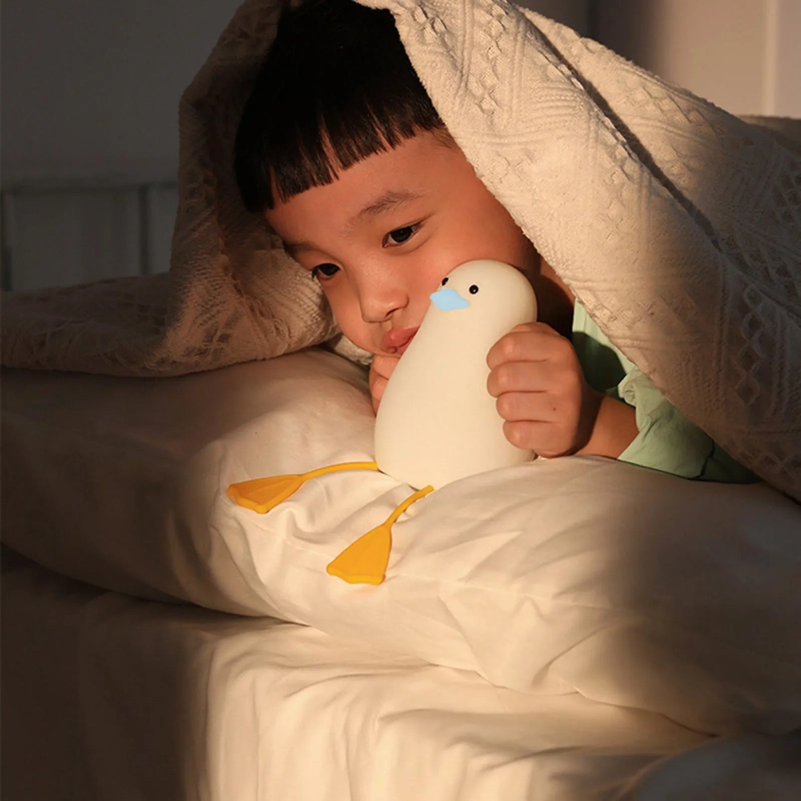 Seagull silicone night light in yellow with soft warm glow, compact size fits nursery bedside