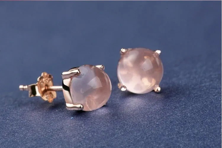 Women's rose gold Korean style stud earrings with synthetic ross quartz crystal inlay in drop shape