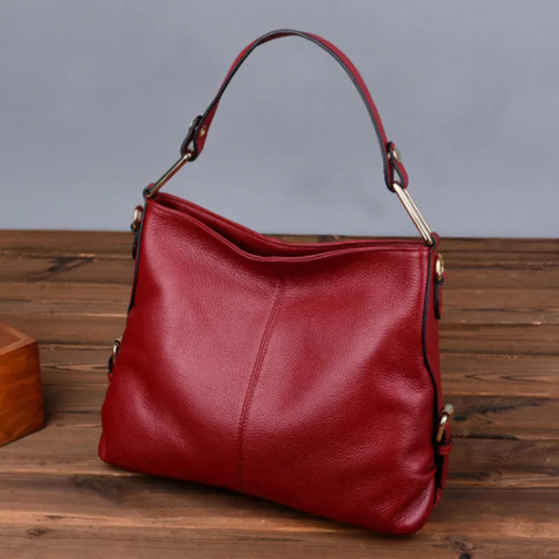 Genuine leather women's crossbody bag in vertical square shape with multiple zipper compartments