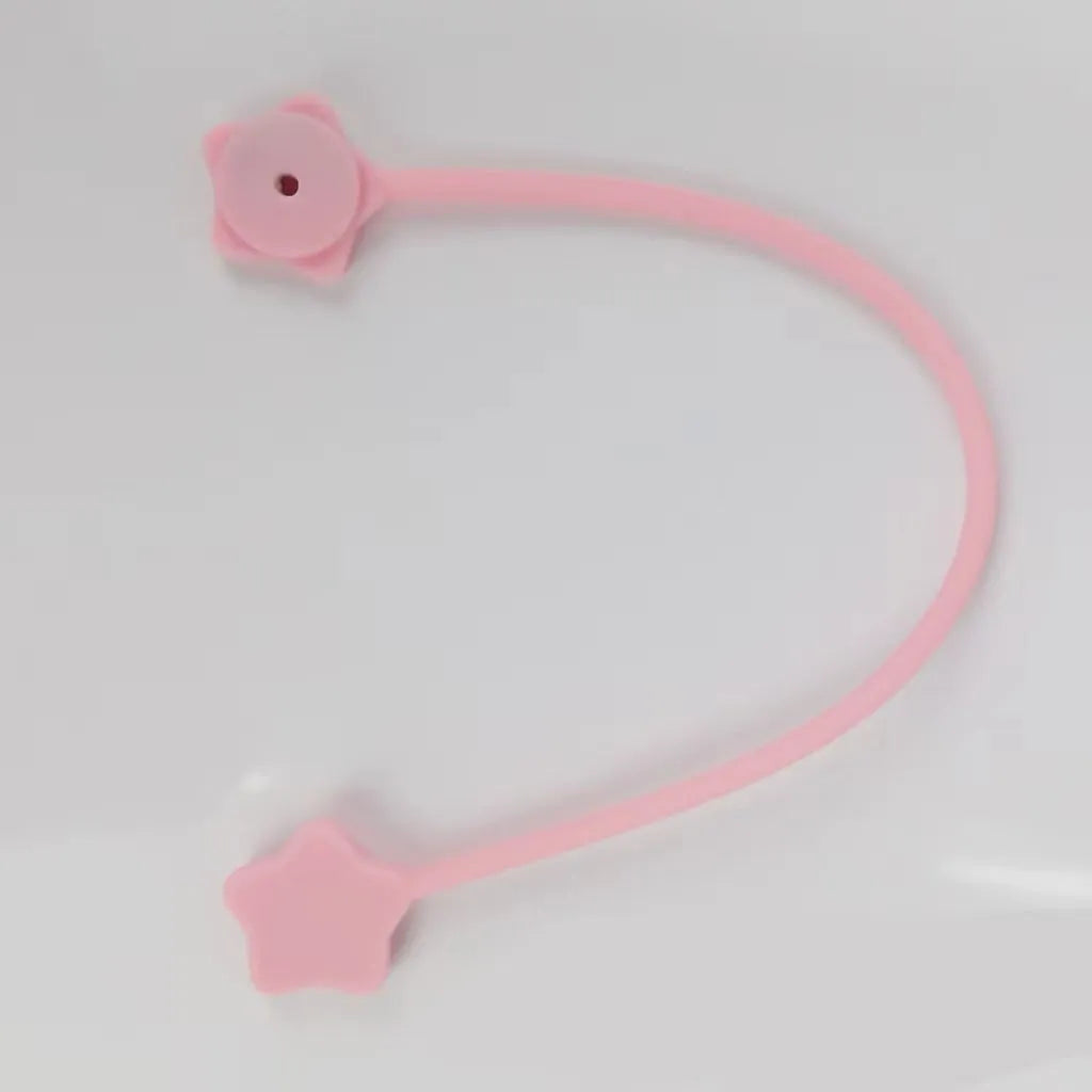 Star-shaped silicone magnet wire winder organiser for headphone and computer cables in multiple colours